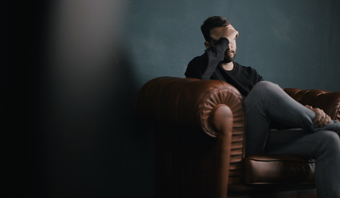 Thinking Man on Couch