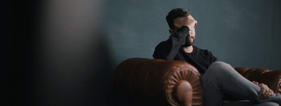 Thinking Man on Couch