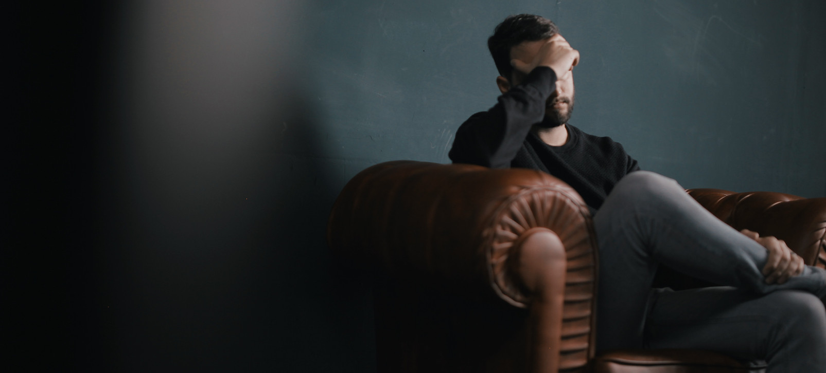 Thinking Man on Couch