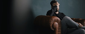 Thinking Man on Couch