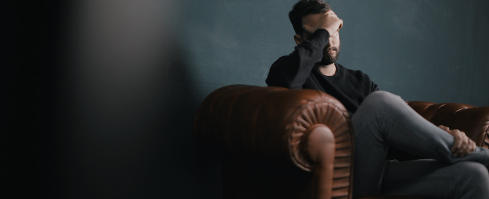 Thinking Man on Couch