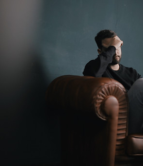 Thinking Man on Couch