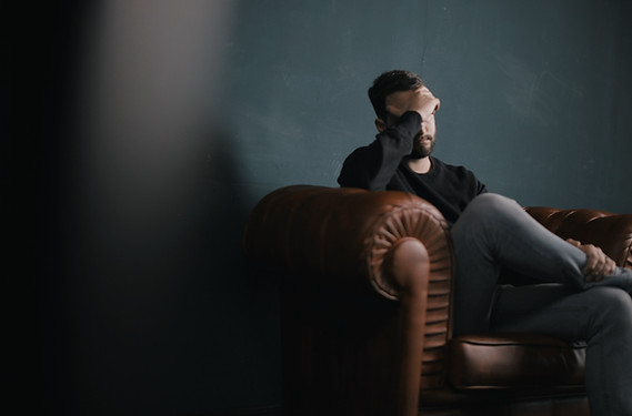 Thinking Man on Couch