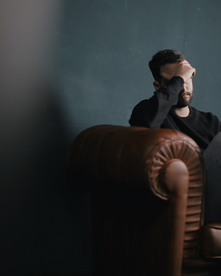 Thinking Man on Couch