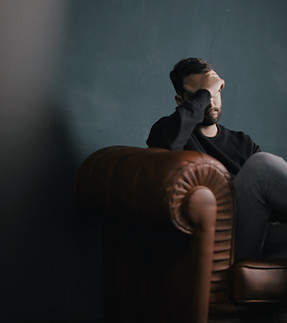 Thinking Man on Couch