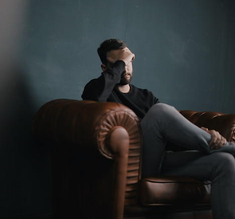 Thinking Man on Couch