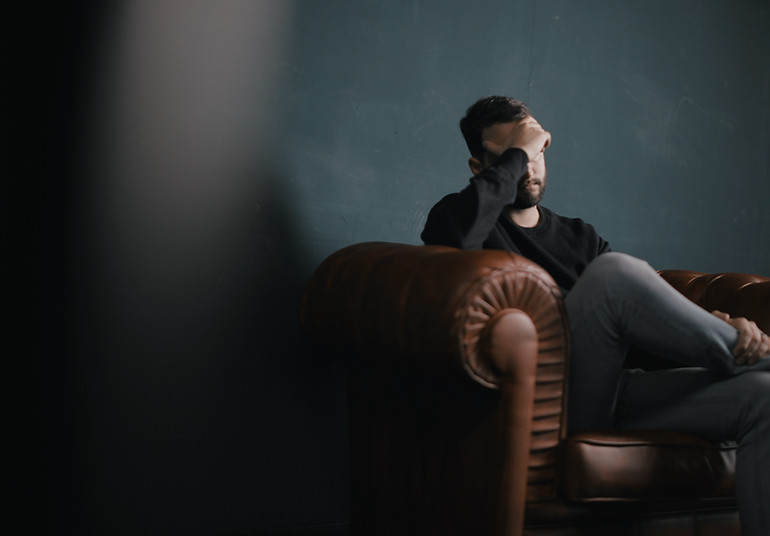 Thinking Man on Couch