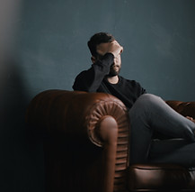 Thinking Man on Couch