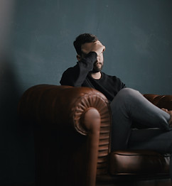 Thinking Man on Couch