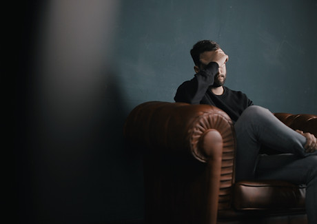 Thinking Man on Couch