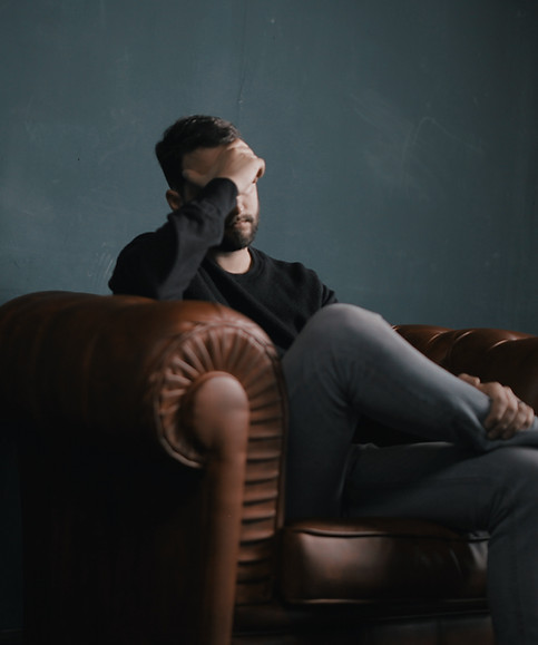 Thinking Man on Couch