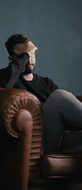Thinking Man on Couch