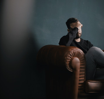 Thinking Man on Couch