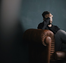Thinking Man on Couch