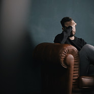 Thinking Man on Couch