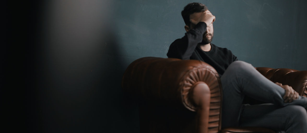 Thinking Man on Couch
