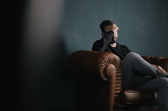 Thinking Man on Couch