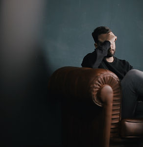 Thinking man on couch