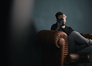 Thinking Man on Couch