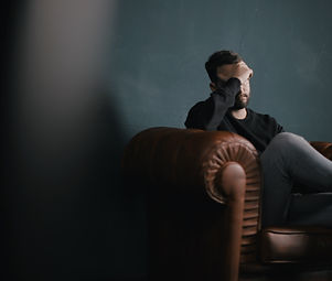 Thinking Man on Couch