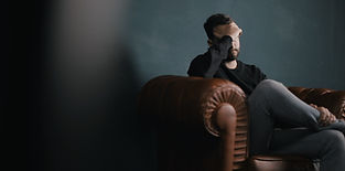 Thinking Man on Couch
