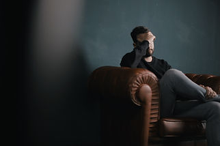 Thinking Man on Couch