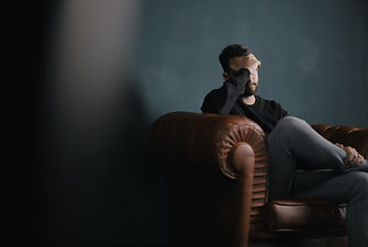 Thinking Man on Couch