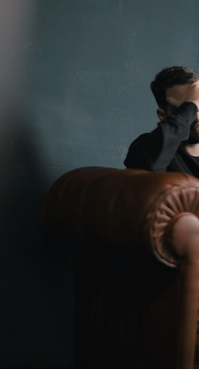 Thinking Man on Couch