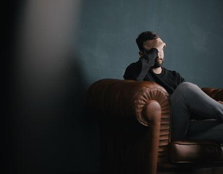 Thinking Man on Couch