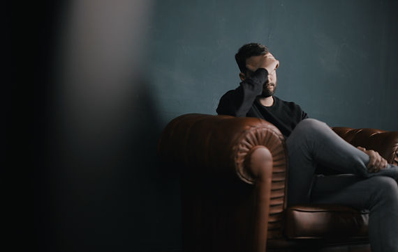 Thinking Man on Couch