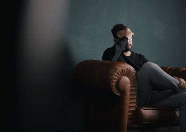 Thinking Man on Couch