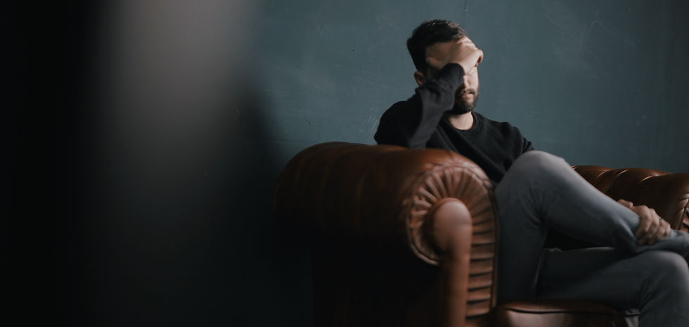 Thinking Man on Couch