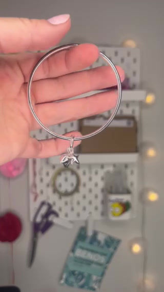 Thumbnail: Hallmarked Silver Bangle with Two Charms