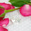 Thumbnail: Solid Silver Hand Cast Heart Dropper Earrings Valentine's Day
