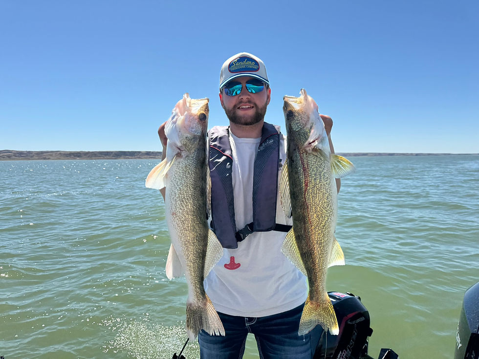 Happy Client with 2 beautiful walleyes