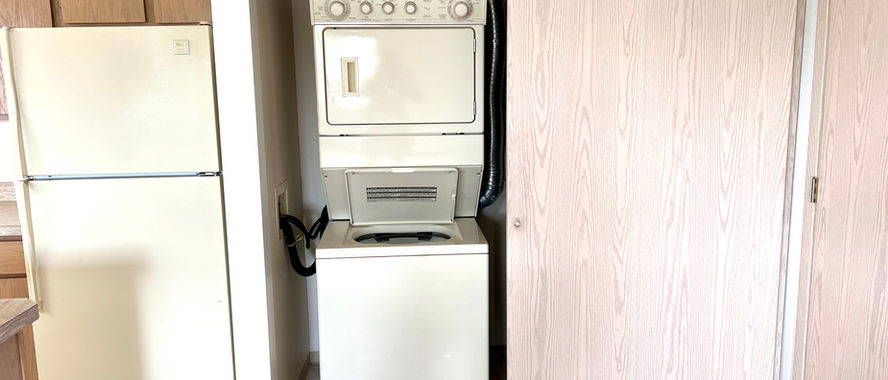 washer and dryer inside condo of retirement community