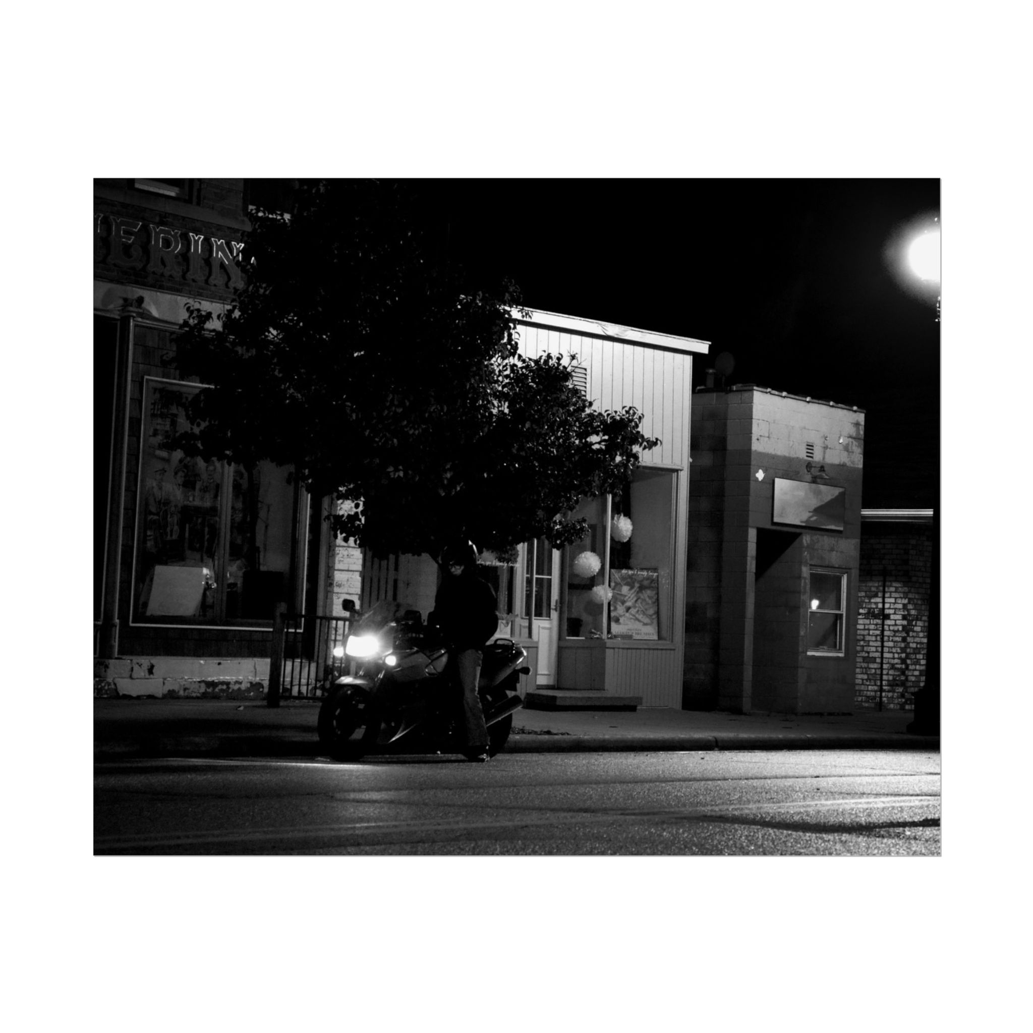 Black & White Biker Sitting on a Motorcycle Downtown Photography Poster Print