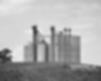 Thumbnail: Black & White Grain Elevator on a Hill Photography Print