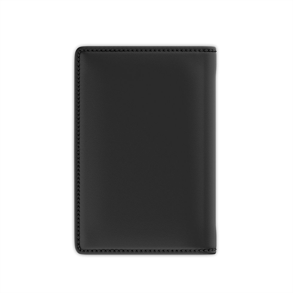 Slim passport cover with plum bow pattern, RFID-blocking lining, and card slots for organized travel.