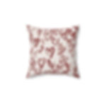Soft, square throw pillow with a hand-drawn heart pattern in warm brick-red on a creamy background.