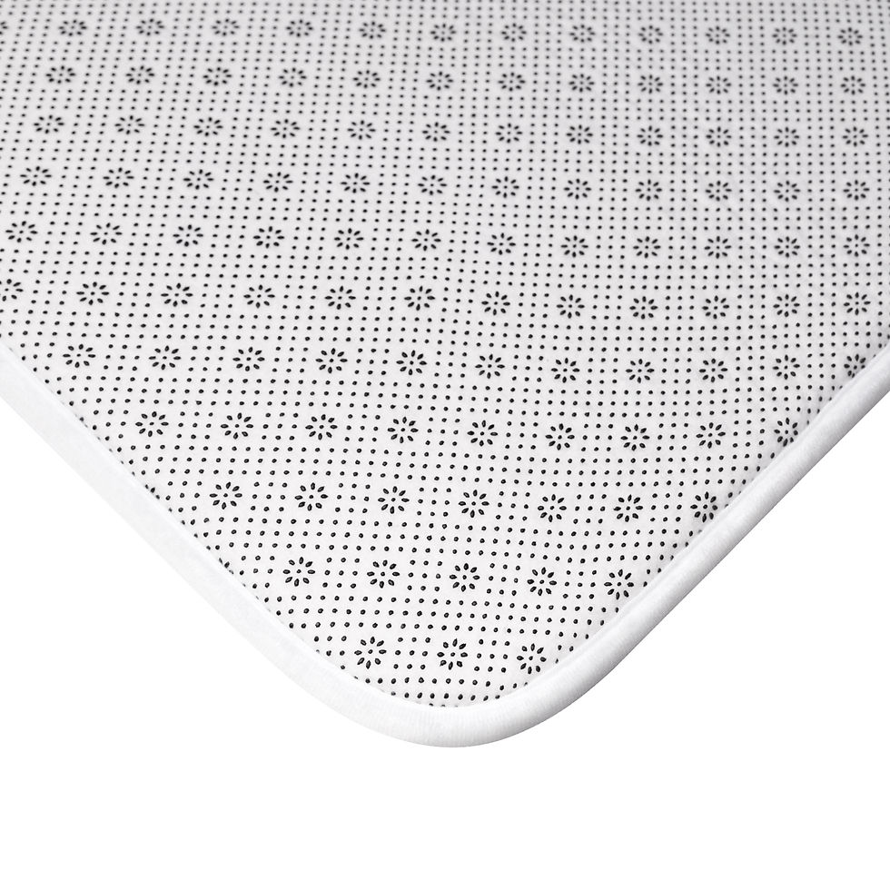 Thumbnail: Memory-foam bath mat with teal geometric tile print and anti-slip backing for a calm, coastal bathroom.