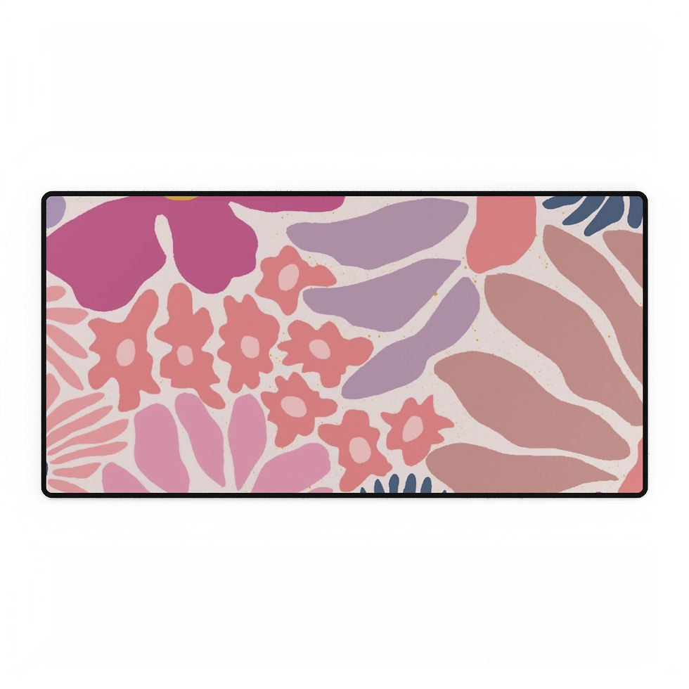 Floral desk mat with pink, coral, and lavender abstract botanical print and non-slip rubber base.