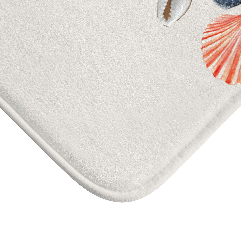 Memory-foam bath mat with watercolor seashell, starfish, dolphin, and sun coastal design and anti-slip backing.