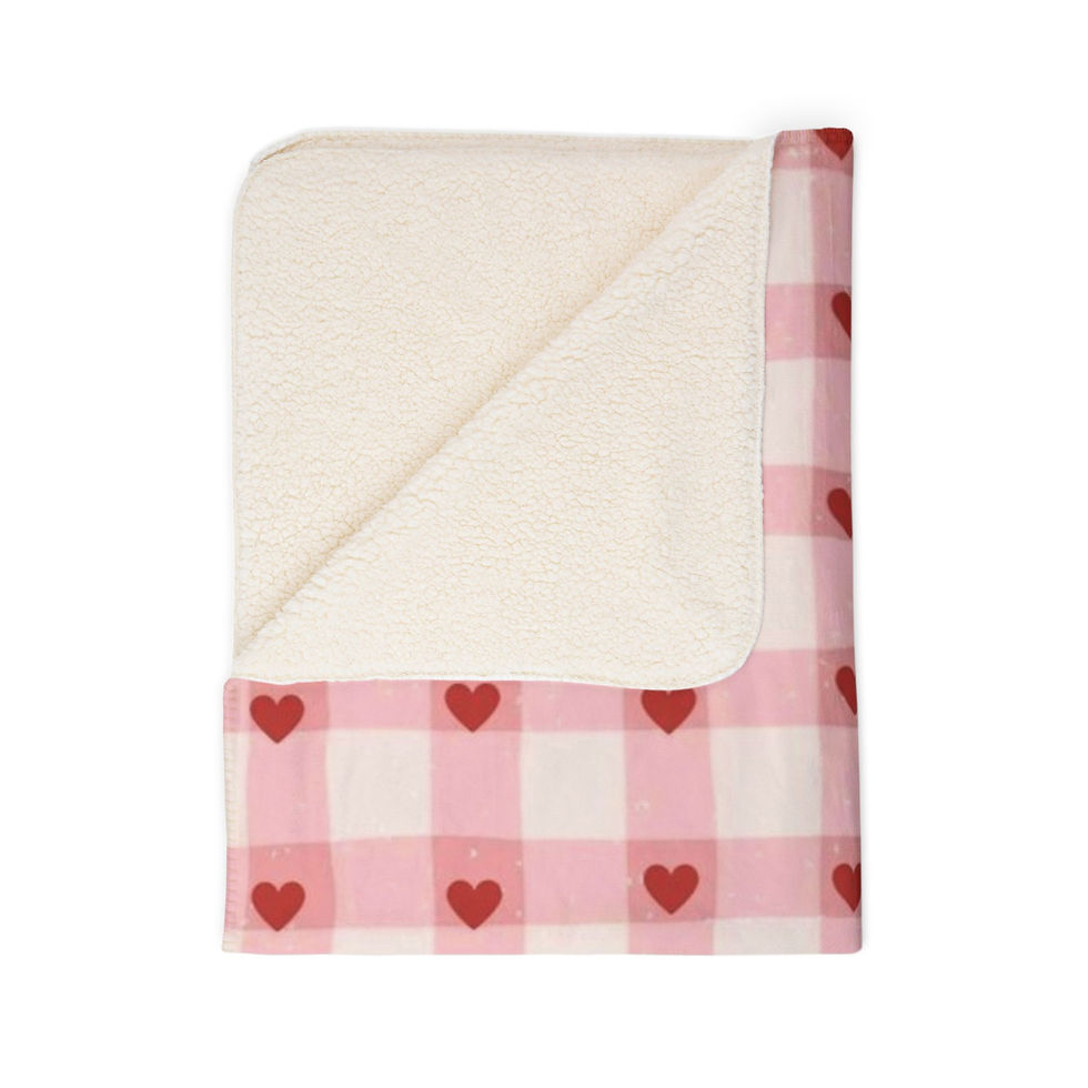 Thumbnail: Sherpa-style fleece blanket with pink gingham and tiny red heart pattern.