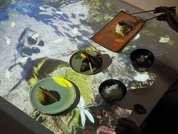 Table-Based Interactive System for Augmenting Japanese Food Culture Experience