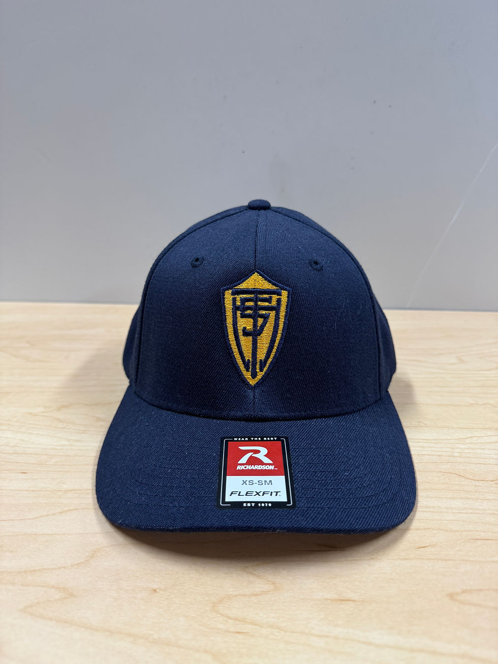 TB437 Navy Flexfit with THS Football Shield