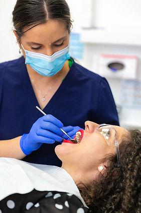 Emergency Dentist performing check.jpg