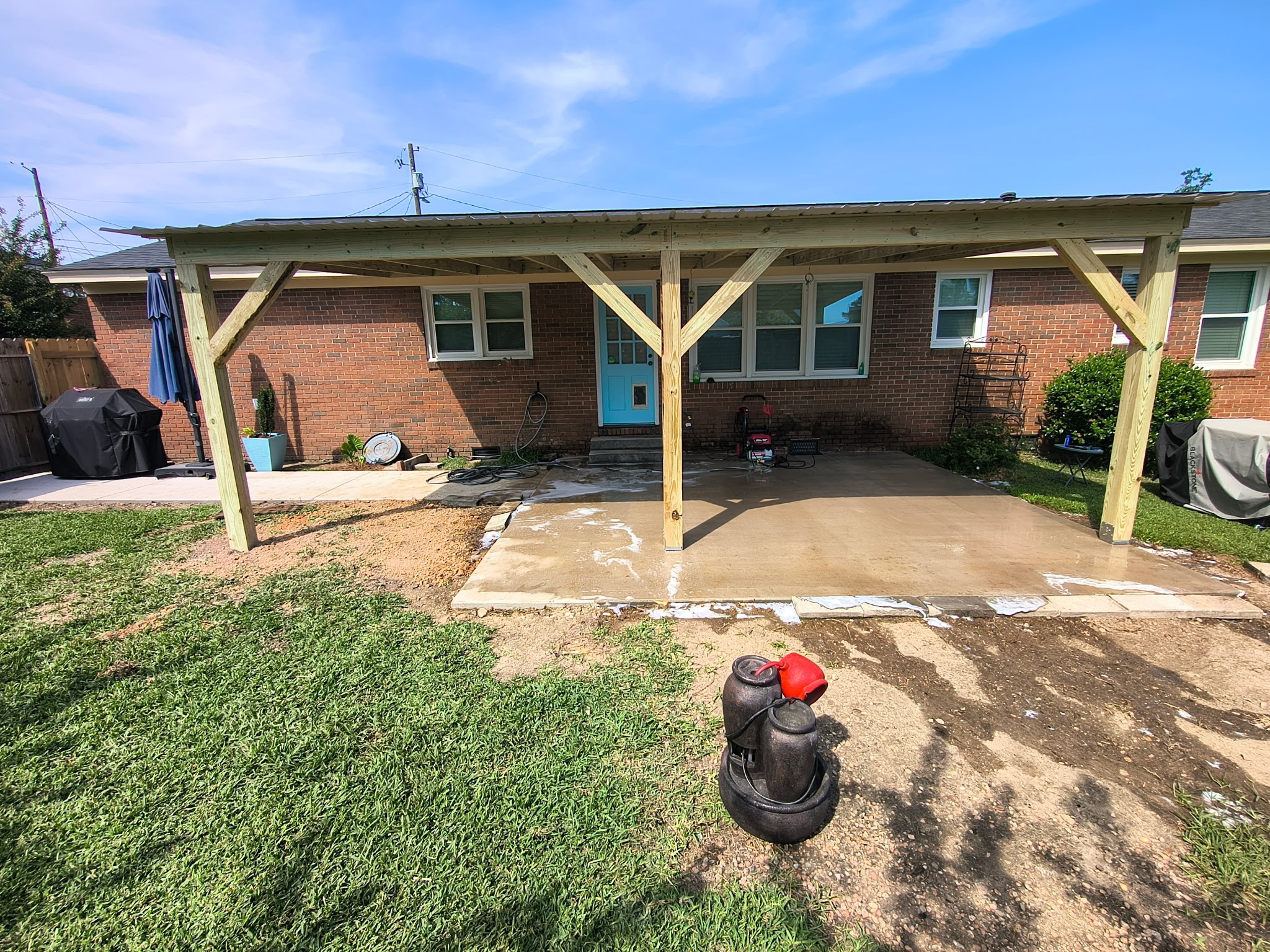 Ironline attached patio cover with knee braces