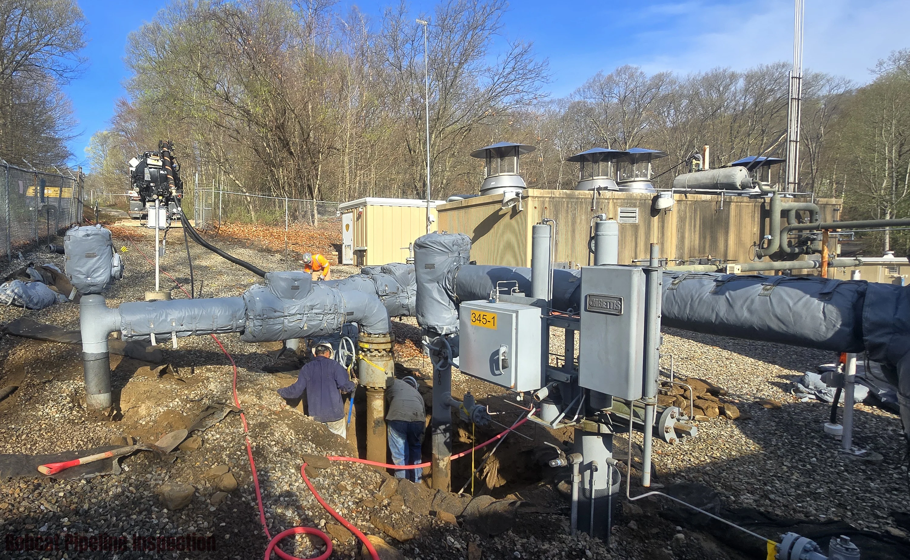 Personnel completing a Direct Assessment of a station.