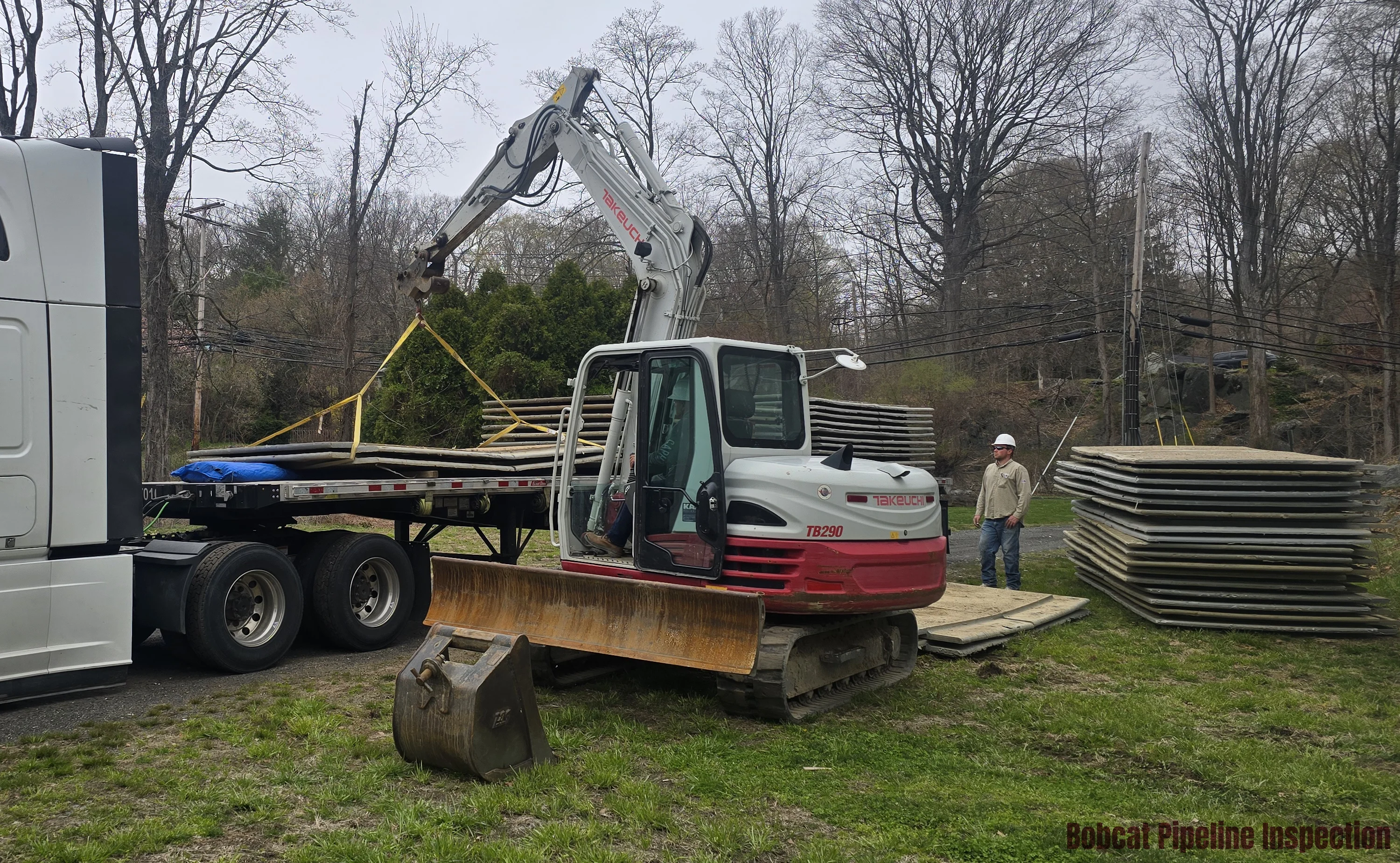 Unloading mats that will be used to protect crew, equipment, and the environment during work.